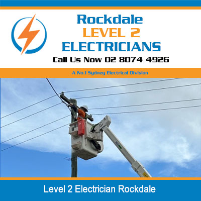 Level 2 electrician in elevated work platform servicing power lines in Rockdale