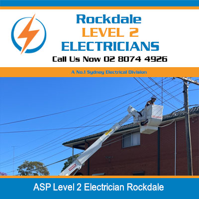 Level 2 electrician on residential roof working near power lines in Rockdale